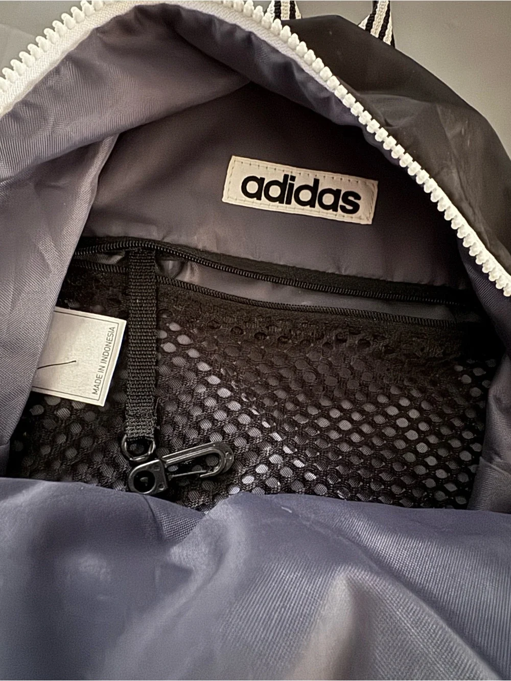 adidas Mini Black Backpack with White Logo and Striped Straps - Picture 5 of 10